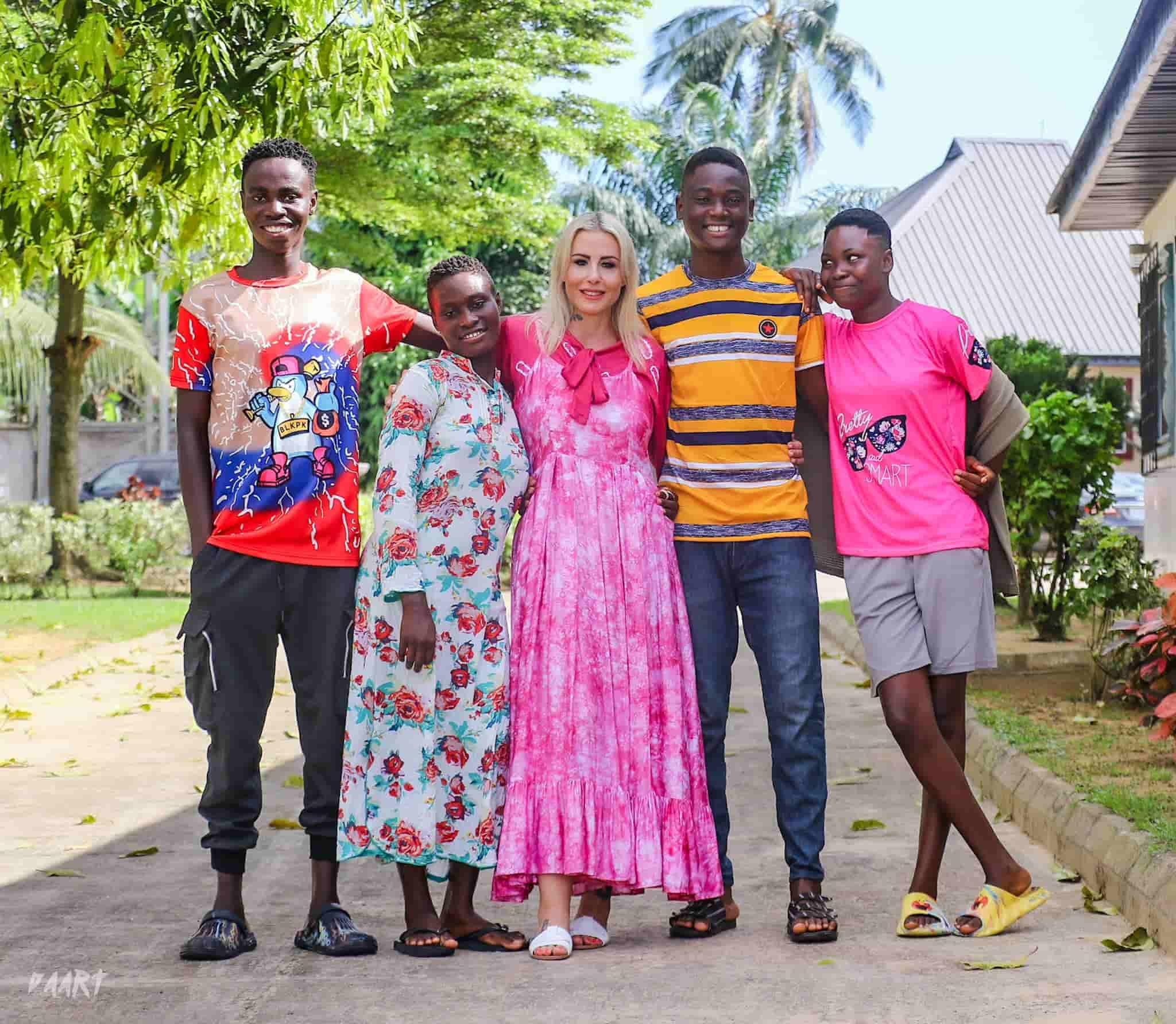 Anja Ringgren Loven poses with children at Land of Hope, Image Credit- Land of Hope, Facebook page