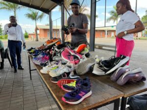 Former athlete Prince Mumba donates shoes to OYDC athletes Image Credit: Facebook