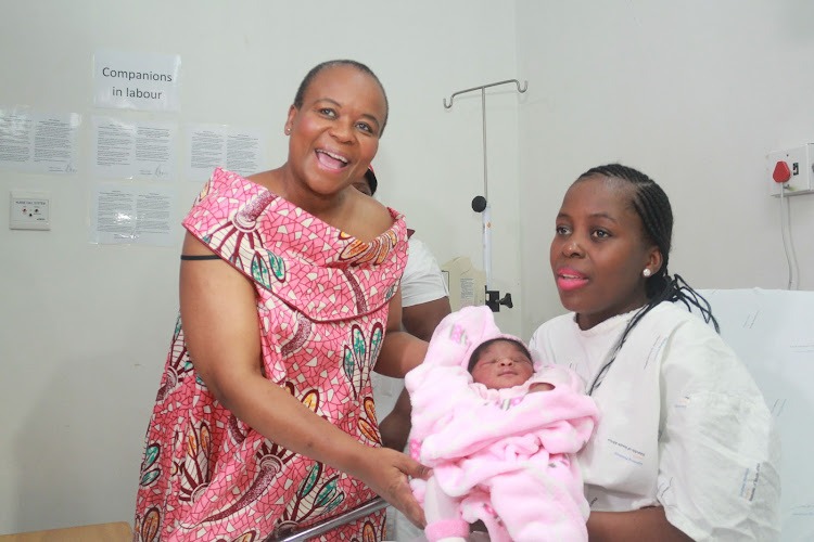 Representative image of the woman with new born baby