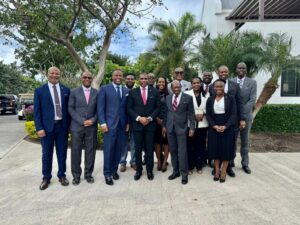 Prime Minister Terrance Drew with other officials during the meeting at Nevis Island