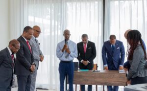 Prime Minister Terrance Drew with other officials during the meeting at Nevis Island