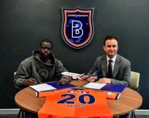 Olivier Kemen while signing contract with Istanbul Basaksehir
