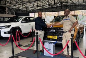 Fathers of Sir Wicknell Chivayo with new car 