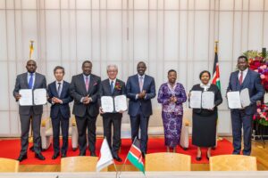 President William Ruto with other official delegates while showing the signed the deal with Toyota Tsusho Corporation 