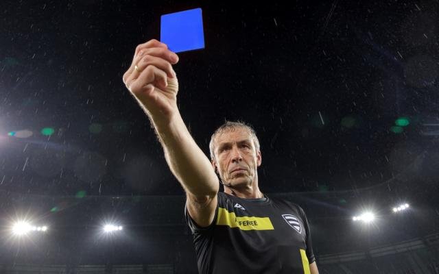 Representative image of a referee showing Blue Card in the field