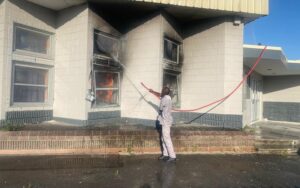 Firefighters while trying to extinguish the fire at Khayelitsha Library 