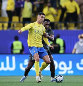 Oumar Gonzalez while stopping Cristiano Ronaldo at a match