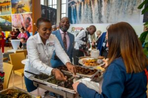 Minister of Tourism Barbara Rwodzi while showcasing rich cuisines of Zimbabwe during ITB Berlin 2024 