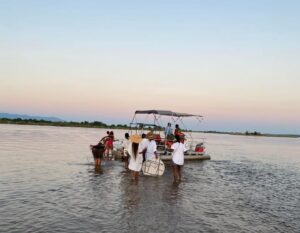 Photograph of boat cruising from Zambezi Trip by La’gullez travel and tours