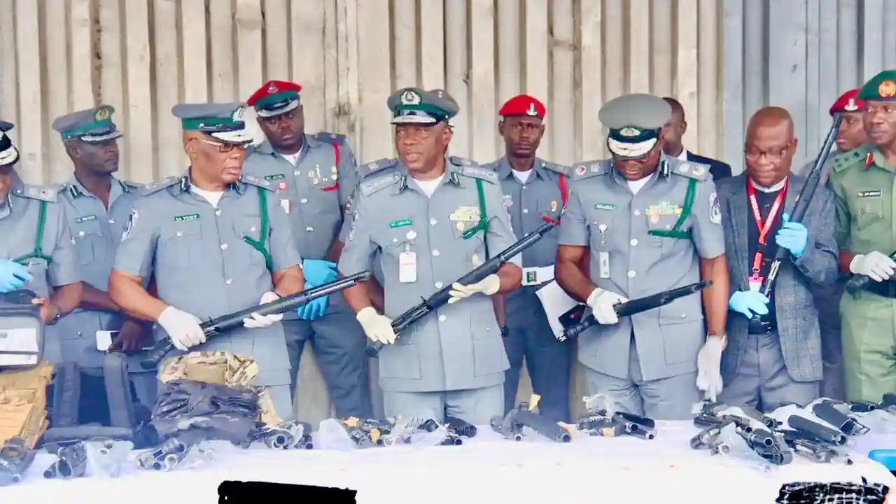 Nigerian CGC during press brief with the seized arms from Lagos Airport