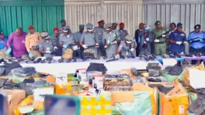 Nigerian CGC during press brief with the seized arms from Lagos Airport
