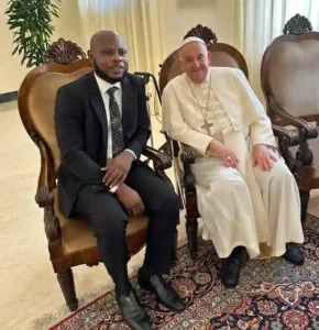 Director of LGBTQI+ rights group Rightify Ghana - Ebenezer Peegah with Pope Francis 