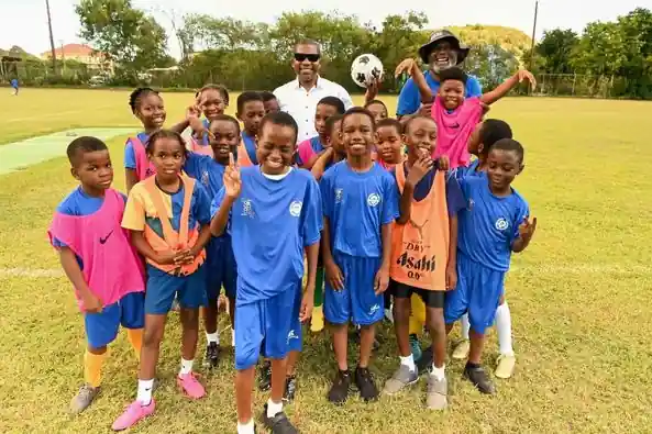 PM Terrance Drew visits youngsters at SFUFC football program, Image: facebook