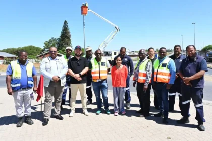 Alderman Xanthea Limberg with Energy Team working on accepted repairment requests