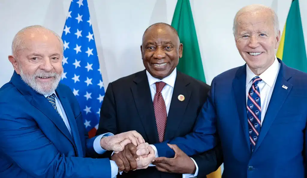 President Cyril Ramaphosa (center) with former US President Joe Biden (right) and president of Brazil (left) while receiving the G20 Presidency