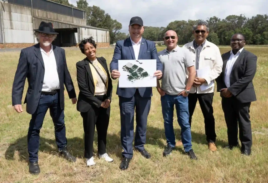 Alderman James Vos with Cape Point Film Studios team at construction site of new film set