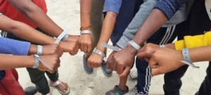 Children wearing bands under Identikidz Programme