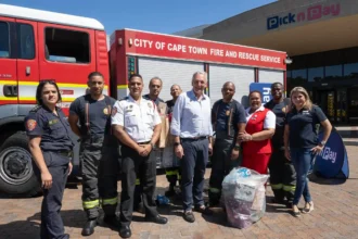 City of Cape Town Firefighters while making donation at eight care facilities