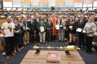 Mayor Geordin Hill-Lewis granting Civic Honours to the recipients