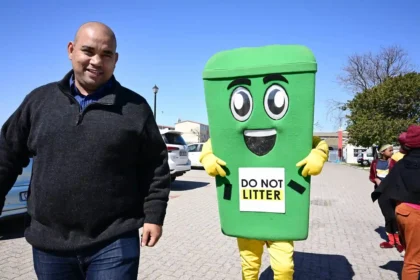 Deputy Mayor Eddie Andrews with Anti-litter mascot 'Bingo'