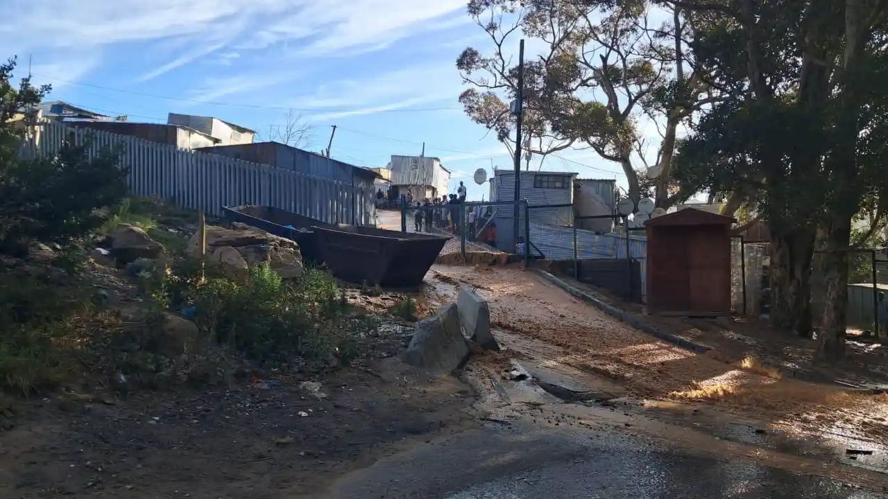 Photograph from pipe burst that caused flooding in town