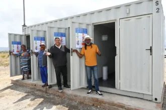 Councillor Zahid Badroodien with the team at handover ceremony of the self-sustaining toilet systems