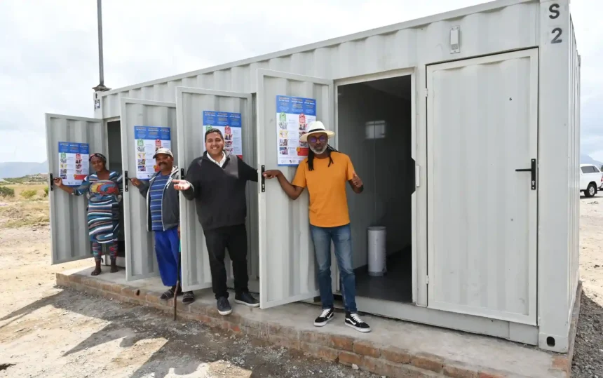 Councillor Zahid Badroodien with the team at handover ceremony of the self-sustaining toilet systems