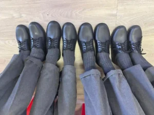 Manenberg pupils showing their school shoes gifted by Deputy Mayor Eddie Andrews and his team 