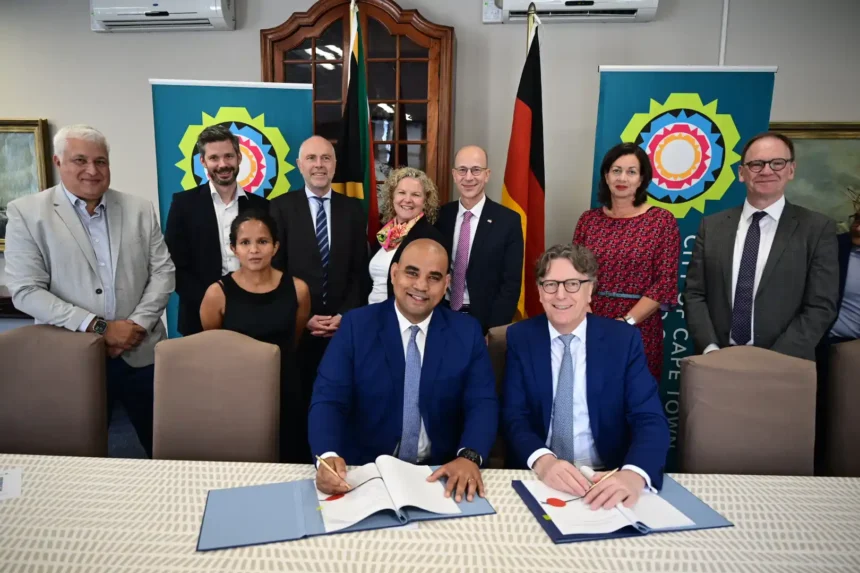 Deputy Mayor Eddie Andrews while signing the agreement in Cape Town