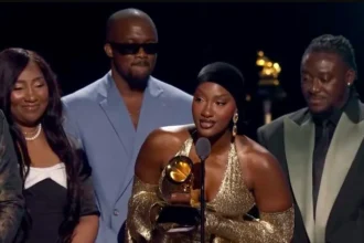 Tems while receiving award at Grammy 2025