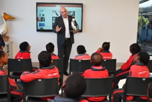 Alderman James Vos while explaining about SANCCOB to young learners