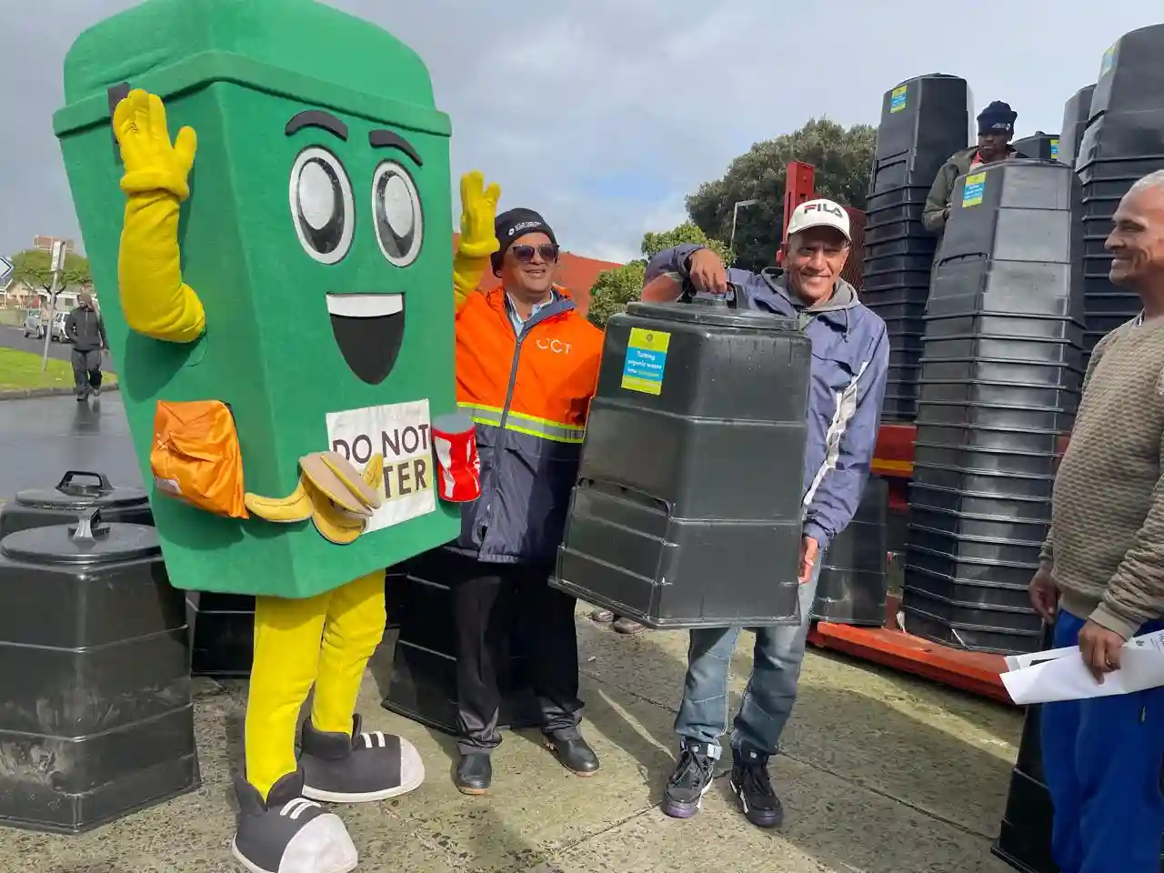 City officials distributing Home Composting Bins in Cape Town