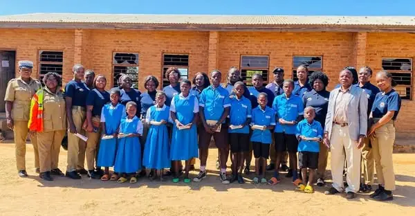 Dedza Police Women's Network donates school supplies to pupils