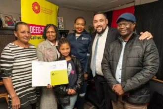 Human Settlements Team with recipient of Title Deeds in Cape Town