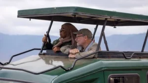 Tourists observing Tanzania Wildlife