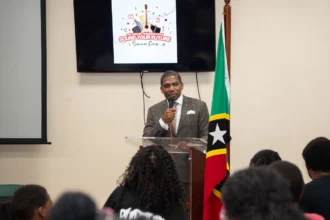 Prime Minister Dr. Terrance Drew while interacting with children during Sound Your Future Summer Camp 2025, St. Kitts and Nevis
