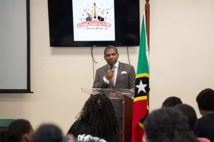 Prime Minister Dr. Terrance Drew while interacting with children during Sound Your Future Summer Camp 2025, St. Kitts and Nevis