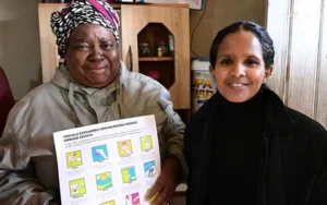 Greenfield resident with Alderman Xanthea Limberg, who received benefits of Cape Town Electrification Project