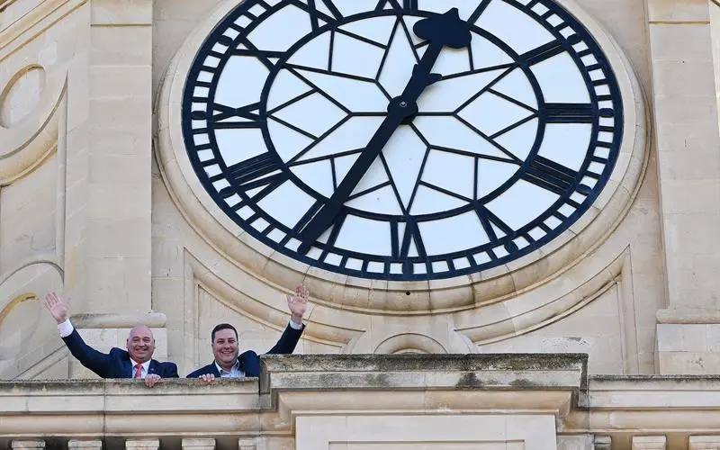 Mayor Geordin Hill-Lewis and Alderman James Vos posing at City Hall Clock, Cape Town