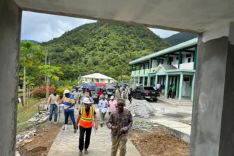 National Security Minister Rayburn Blackmoore while examining the construction sites of Magistrate Court and Fire Station, in Dominica