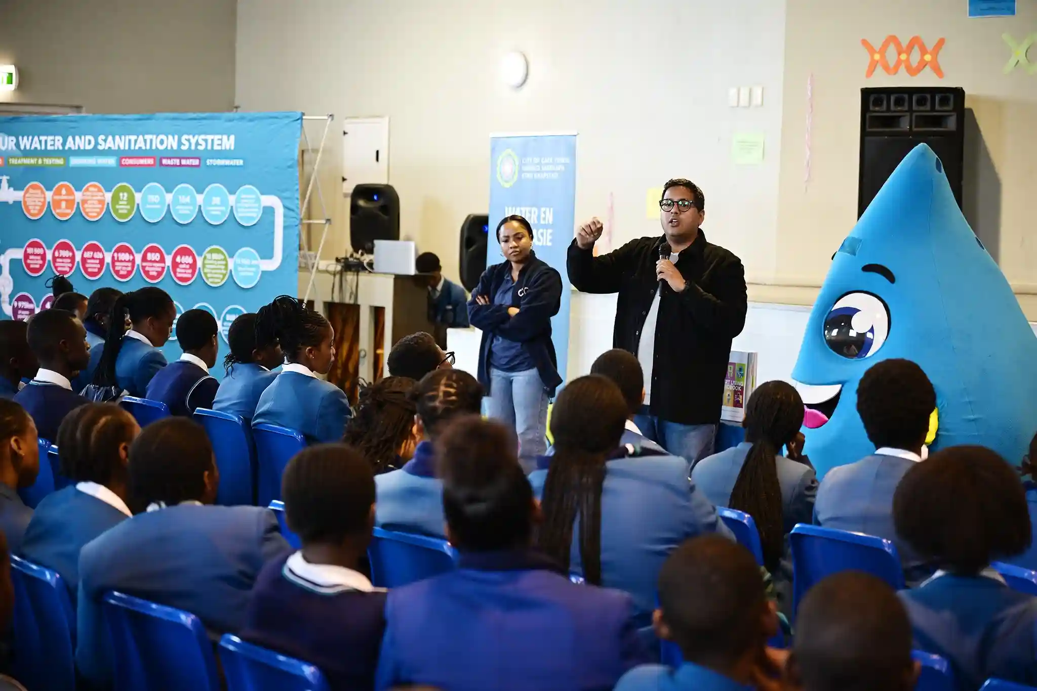 Councillor Zahid Badroodien with Water Mascot - Mzansi during water matter discussion in Cape Town