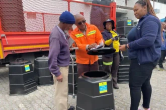 Urban Waste Management team in Khayelitsha, observing composting practice by residents