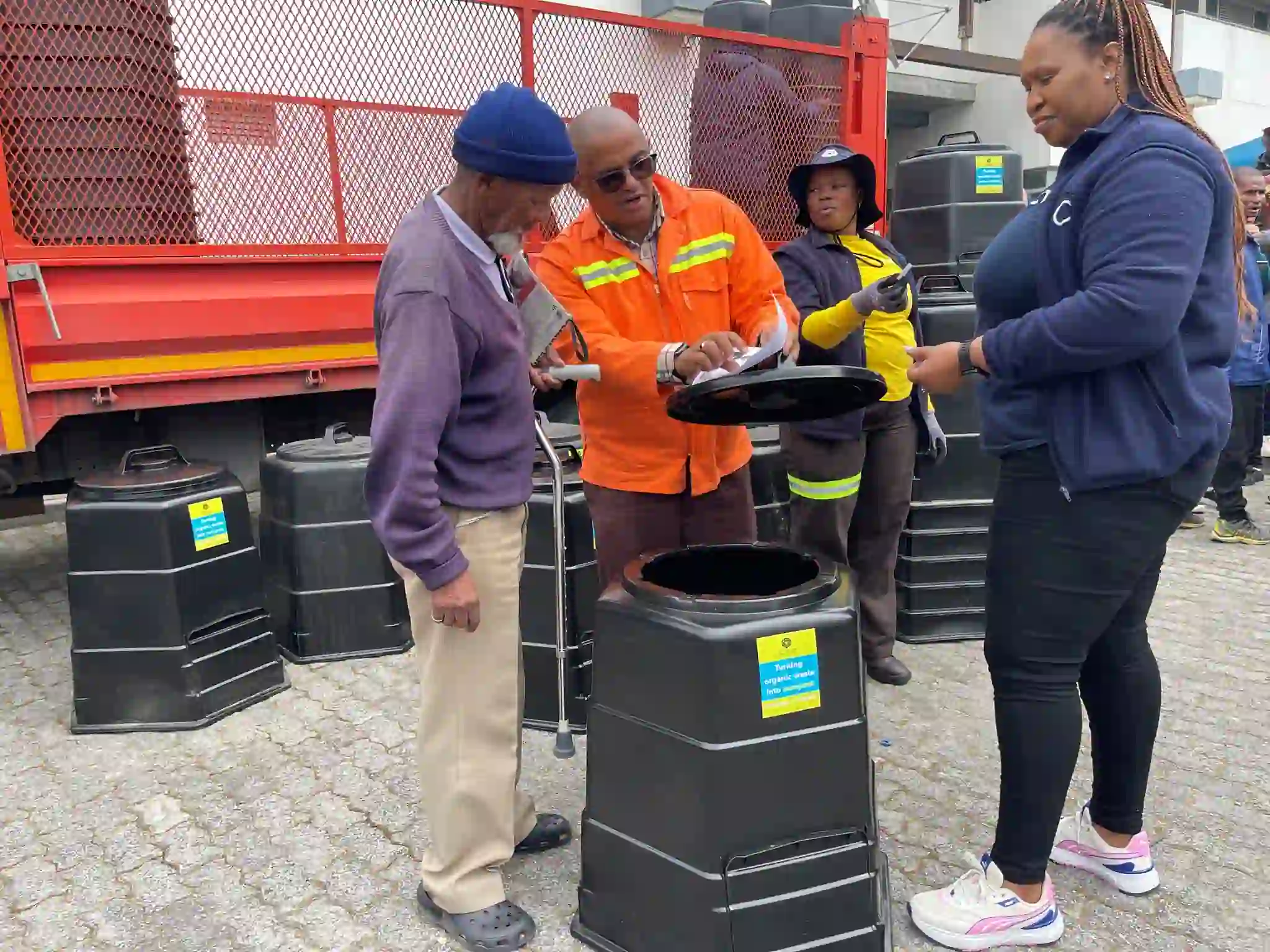 Urban Waste Management team in Khayelitsha, observing composting practice by residents