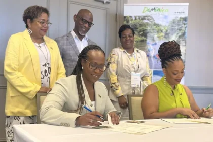 CEO of BTMI and DDA while signing the MOU to promote Tourism
