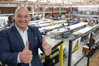 Alderman James Vos at a clothing factory in Cape Town