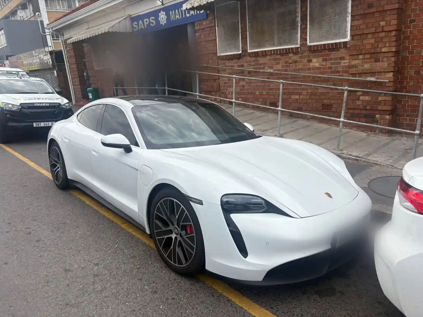 Porsche Taycan that hit a vehicle in city traffic, in Cape Town