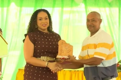 Minister for Housing and Urban Development while granting resilient home to Stadium Forecourt Resident in Dominica