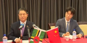 Ambs Chu Maoming reaffirming Dominica-China cooperation during press conference