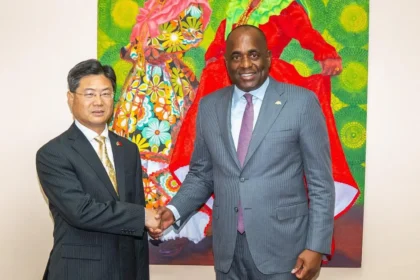 Ambs Chu Maoming with PM Roosevelt Skerrit for Dominica-China cooperation