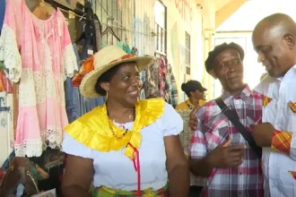 Prime Minister Roosevelt Skerrit with locals of Dominica